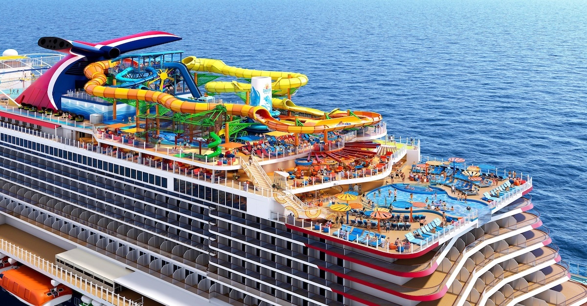 Cruise ship at sea at sunset